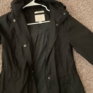 Black raincoat/ windbreaker